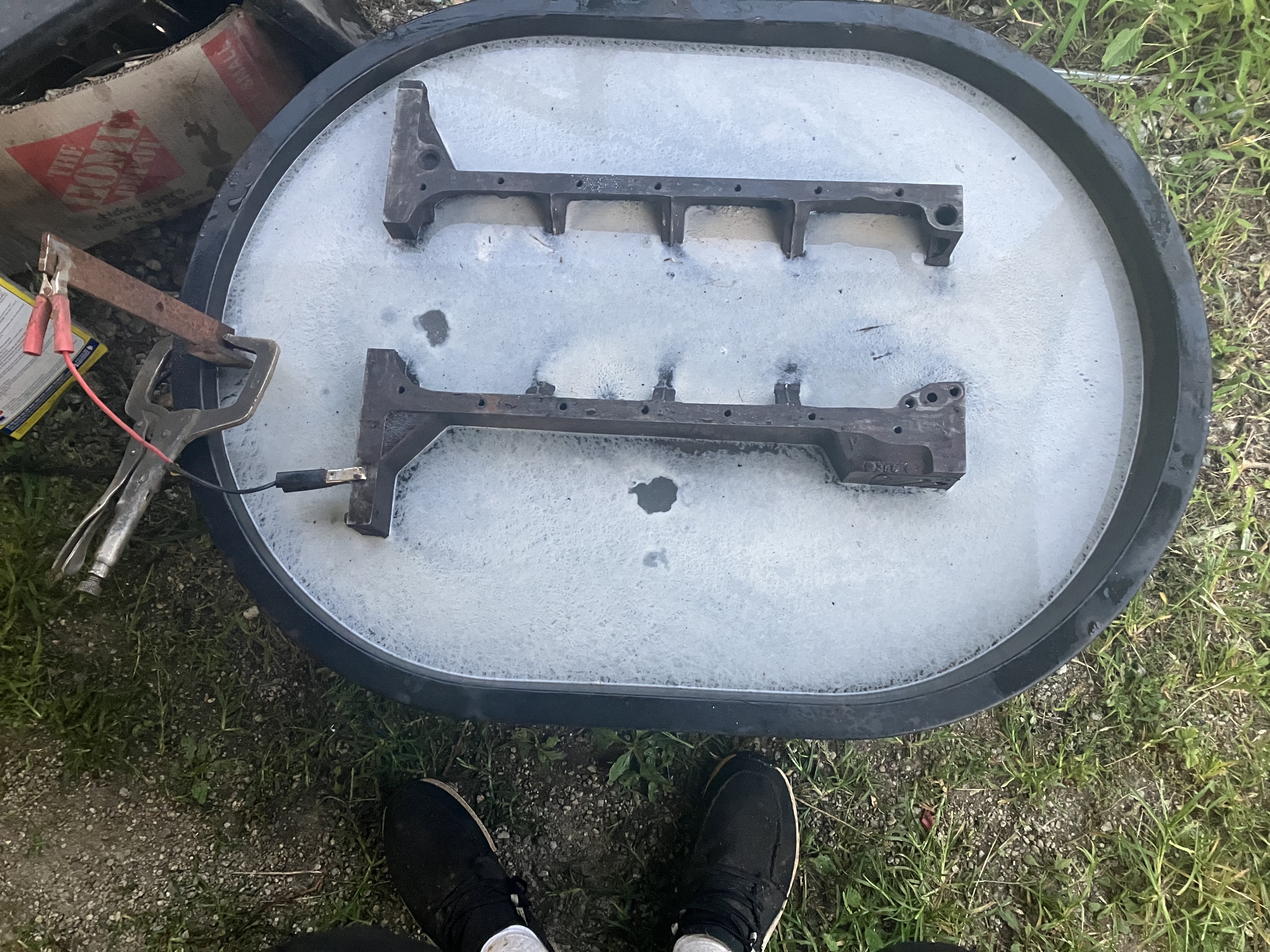 Engine part before and after electrolytic rust removal